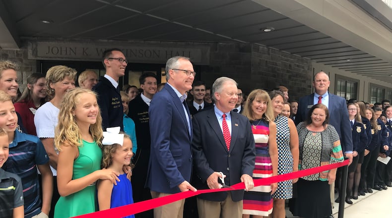 Lt. Gov. Casey Cagle, left center, and state senator John Wilkinson cut the ribbon to officially open the new John K. Wilkinson Hall at the Georgia FFA-FCCLA Center in Covington.
