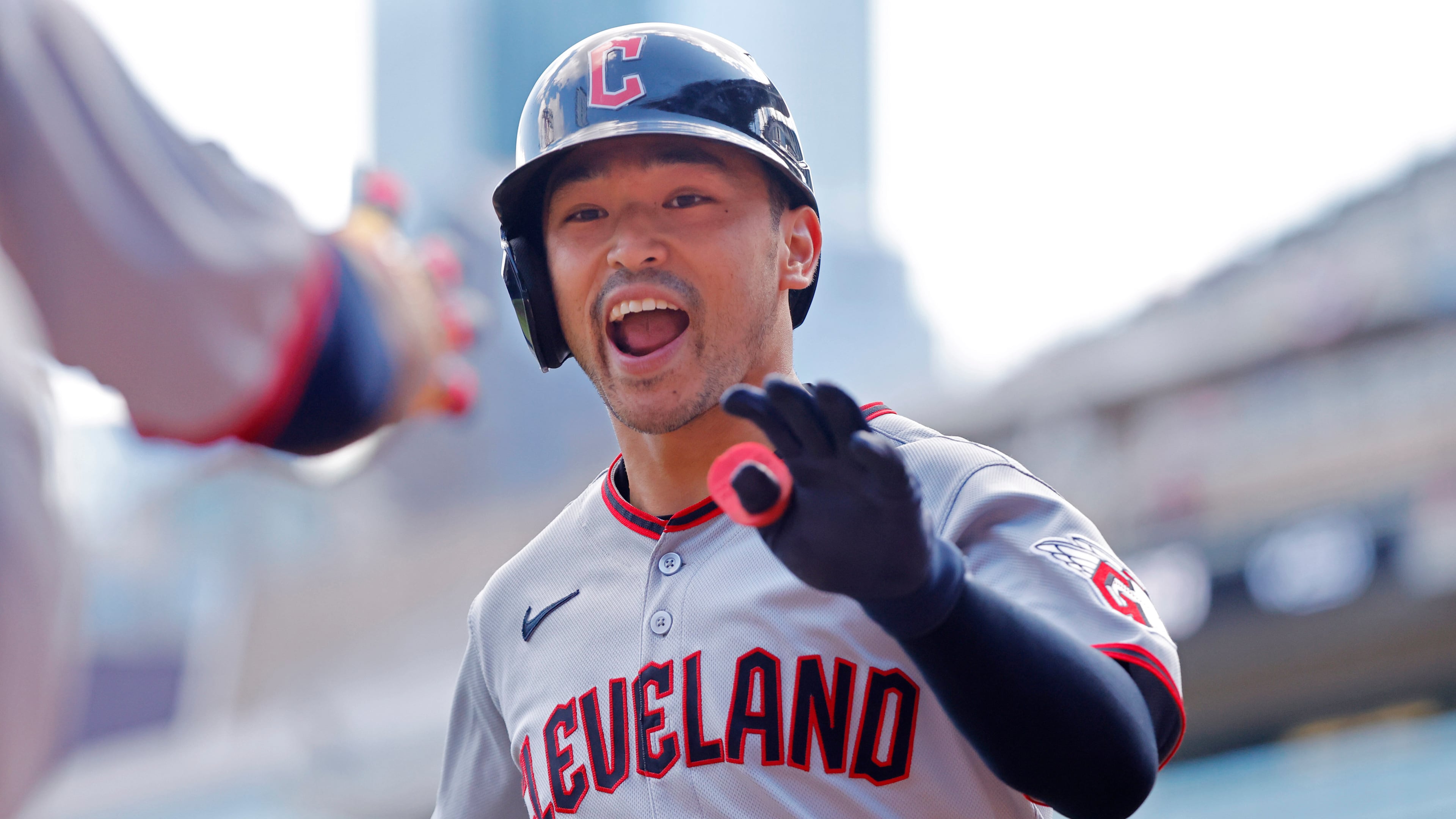 Cleveland Guardians' Steven Kwan celebrates after his leadoff home run against the Minnesota Twins in the first inning of a baseball game Sunday, Sept. 21, 2025, in Minneapolis. (AP Photo/Bruce Kluckhohn)