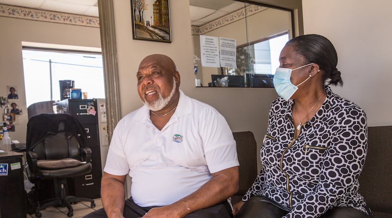 Bill and Faith Collins both tested positive for COVID-19 in November and were given monoclonal antibody treatments and are now back to work at Collins Auto Treatment in Rome. Bill said the hardest part of being sick was when his 4-year-old grandchild came over and he was not able to hug her. (Jenni Girtman for The Atlanta Journal-Constitution)