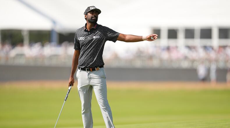 Sahith Theegala reacts after missing a putt on the fourth hole during the third round of the U.S. Open golf tournament at Shinnecock Hills Golf Club in Southampton, N.Y., Saturday, June 20, 2026.(AP Photo/George Walker IV)