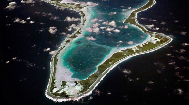 FILE - This image released by the U.S. Navy shows an aerial view of Diego Garcia in the Chagos Island group. (U.S. Navy via AP, File)