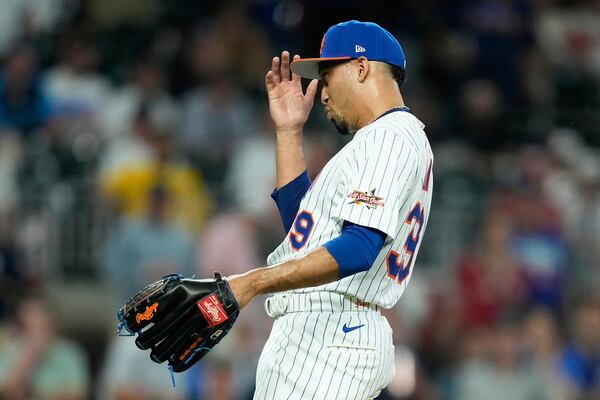 New York Mets pitcher Edwin Díaz calls for challenge during ninth inning at the MLB baseball All-Star game between the American League and National League, Tuesday, July 15, 2025, in Atlanta. (AP Photo/Brynn Anderson)