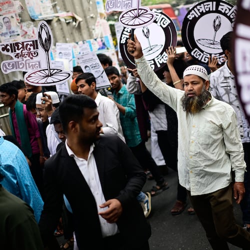 Supporters of Bangladesh's National Citizen Party hold a campaign rally ahead of next month's national elections in Dhaka, Bangladesh, Thursday, Jan. 22, 2026. (AP Photo/Mahmud Hossain Opu)