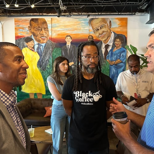 Former Republican Lt. Gov. Geoff Duncan (right) speaks about his Democratic campaign for governor Sept. 17, 2025, at Black Coffee Co., in Atlanta. (Jeff Amy/AP)