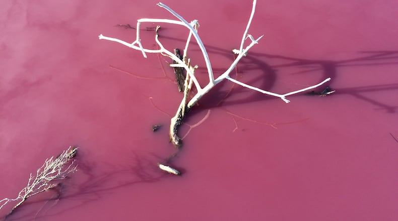This picture of pink lake water is similar what's happening at a salt lake in Westgate Park, Australia, where algae in the salt crust, high temperatures, sunlight and no rainfall turn the lake an incredible color of pink. Finn Propper/Flickr/(CC BY-NC-ND 2.0)