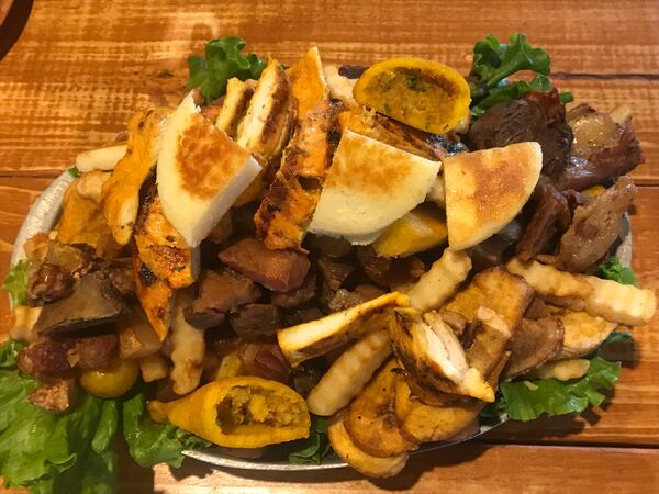 Picada de la Abuela offers a mountain of meat that will please a tableful of hungry carnivores. Photo credit: Ligaya Figueras