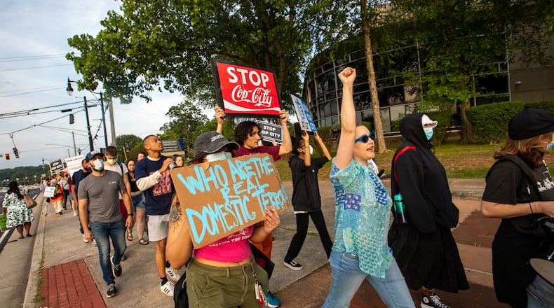 Several organizations and community members gather at the DeKalb County Jail on Wednesday, May 31, 2023 in protest of the GBI raid and arrest of three people with the Atlanta Solidarity Fund accused of money laundering. (Jenni Girtman for The Atlanta Journal-Constitution)