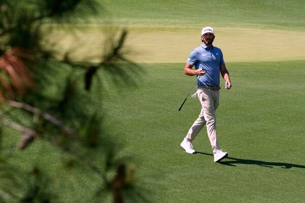 Max Homa walks to the 18th tee during a practice round at the Masters golf tournament, Tuesday, April 8, 2025, in Augusta, Ga. (AP Photo/Matt Slocum)