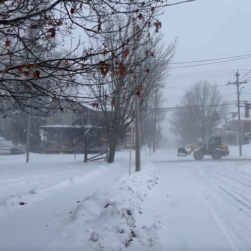 A snowplow sets out in Lowville, N.Y., on Sunday, Nov. 30, 2025. (AP Photo/Cara Anna)