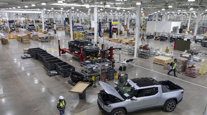 RT1 trucks are assembled and tested, April 14, 2021, before the new Rivian plant fully opens in Normal, Illinois. The company is now in negotiations with Georgia to locate a plant in the state that some suggest could come with 8,000 jobs. (Brian Cassella/Chicago Tribune/TNS)