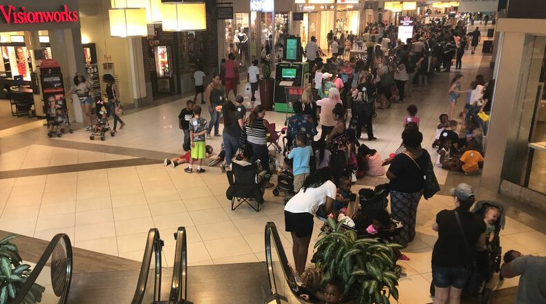 The line for Build-A-Bear Workshop location at Cumberland Mall in Cobb County wrapped around the lower level towards a mall exit.