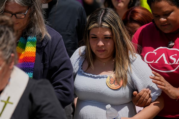 Jennifer Vasquez Sura, center, wife of Kilmar Abrego Garcia arrives at the federal courthouse Wednesday, July 16, 2025, in Nashville, Tenn. (AP Photo/George Walker IV)