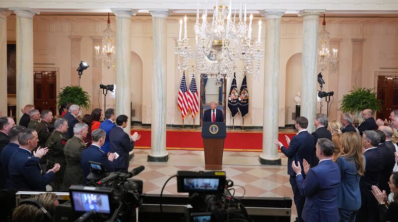 President Donald Trump concludes his speech about the Iran war from the Cross Hall of the White House on Wednesday, April 1, 2026, in Washington. (Alex Brandon/AP Pool)