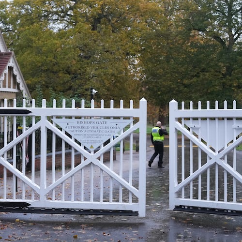 Gates are closing near to the Royal Lodge, following the announcement that Prince Andrew will be stripped of his titles and leave the 30-room mansion he has occupied for more than 20 years in Windsor, England, Friday, Oct. 31, 2025.(AP Photo/Alastair Grant)
