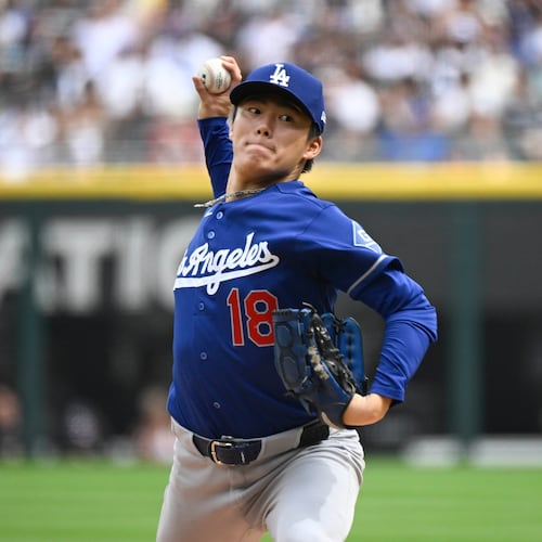 Los Angeles Dodgers pitcher Yoshinobu Yamamoto, of Japan, delivers during the first inning of a baseball game against the Chicago White Sox, Saturday, June 13, 2026, in Chicago. (AP Photo/Matt Marton)