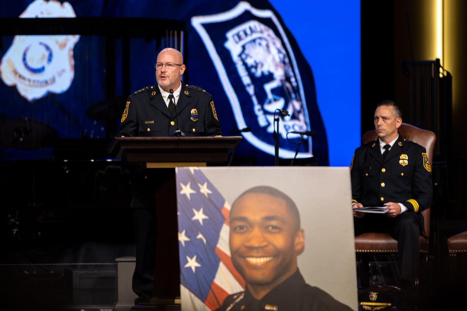 Flags fly at half-staff for slain DeKalb officer’s memorial service


