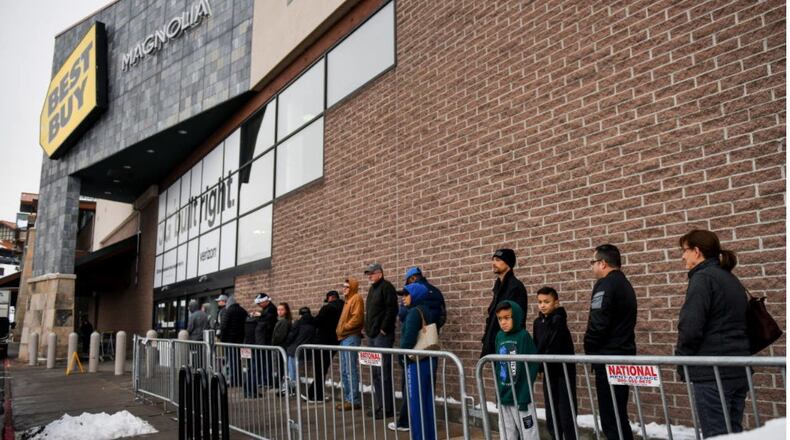 While some shoppers stood in line to wait for stores to open on Black Friday, many other consumers went online at a record pace to buy holiday gifts.