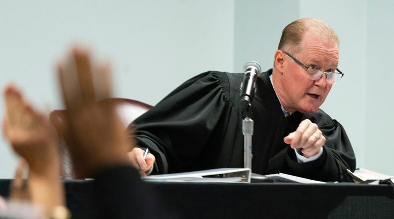 Judge Timothy Walmsley questions potential jurors Tuesday morning during jury selection in the trial of the men charged with killing Ahmaud Arbery. (Elijah Nouvelage/Pool Photo via AP)