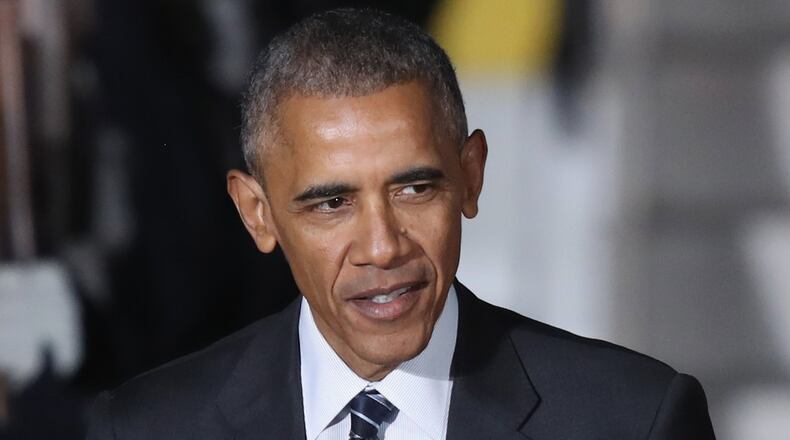 President Barack Obama, arriving in Germany last week, has pardoned 79 more federal drug offenders. (Photo by Sean Gallup/Getty Images)