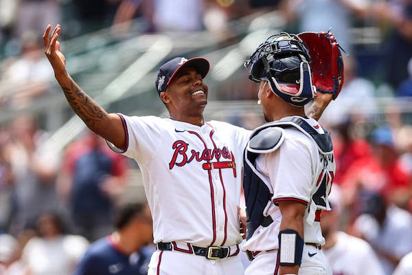 Braves closer Raisel Iglesias reacts after finishing the Nationals off on Thursday.