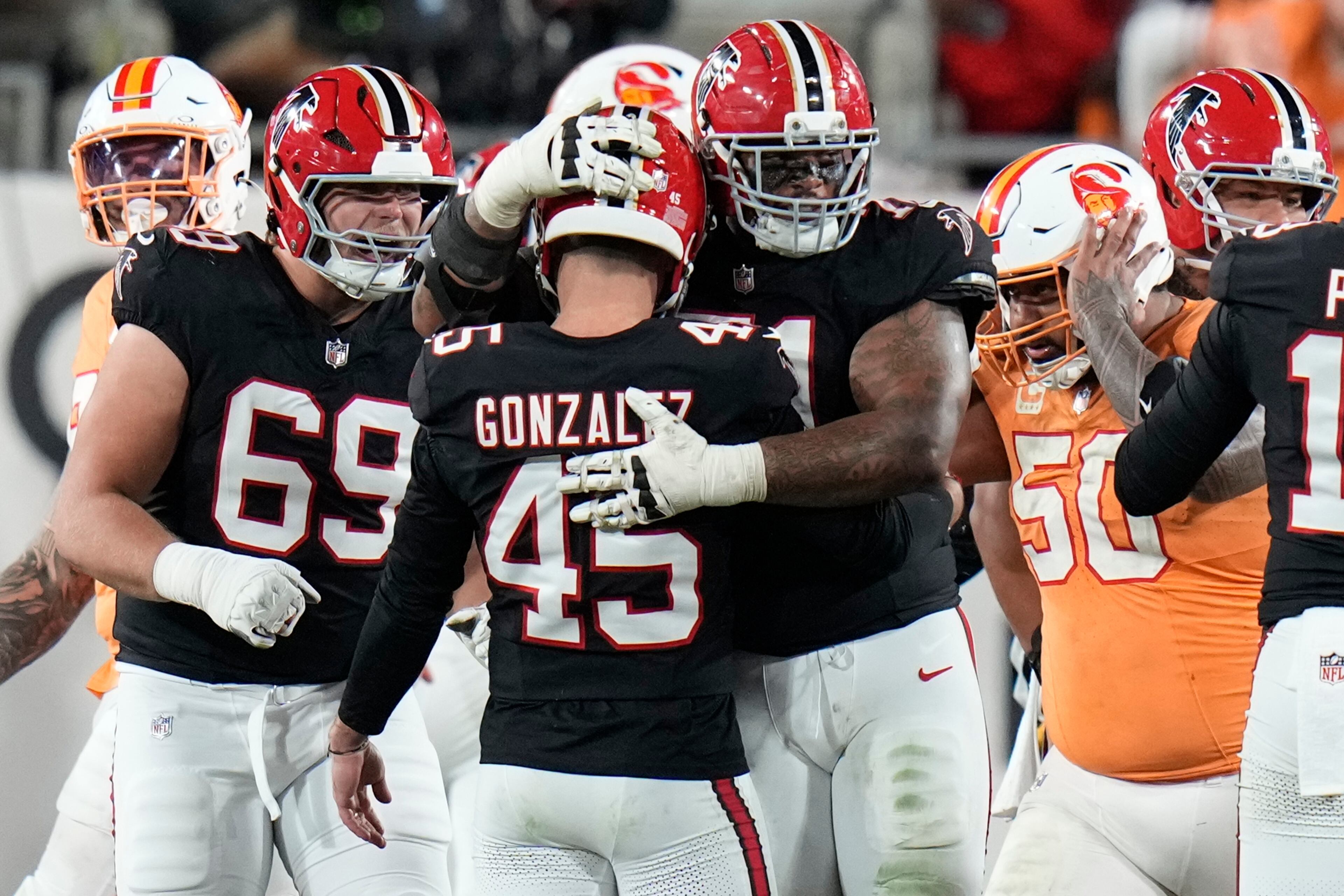 Atlanta Falcons place kicker Zane Gonzalez (45) celebrates his field goal against the Tampa Bay Buccaneers during the second half of an NFL football game, Thursday, Dec. 11, 2025, in Tampa, Fla. (AP Photo/Chris O'Meara)