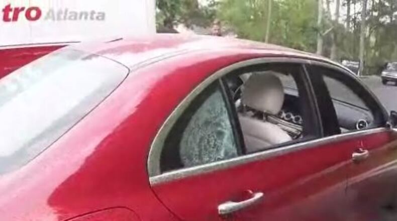 A Mercedes-Benz was struck twice by bullets Monday afternoon on Cobb Parkway in Marietta. (Credit: Channel 2 Action News)