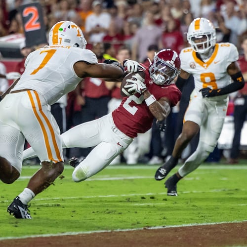 FILE - Alabama wide receiver Ryan Williams (2) grabs a pass in front of Tennessee linebacker Arion Carter (7) during the first half of an NCAA college football game, Oct. 18, 2025, in Tuscaloosa, Ala. (AP Photo/Vasha Hunt, File)