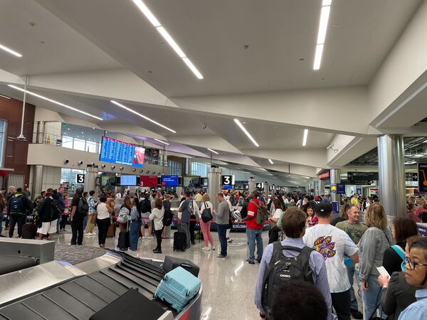 Security lines snaked through the baggage claim area at Hartsfield-Jackson International Airport on the morning of Friday, October 6, 2023.