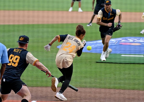 The American League’s Elle Duncan, an ESPN anchor, runs after hitting a grounder during the MLB All-Star Celebrity Softball Game at Truist Park on Saturday, July 12, 2025, in Atlanta. (Hyosub Shin/AJC)