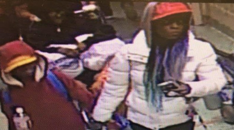 Atlanta police released this picture seeking help identifying the two after a young man with Down Syndrome was dropped off at Grady Hospital.