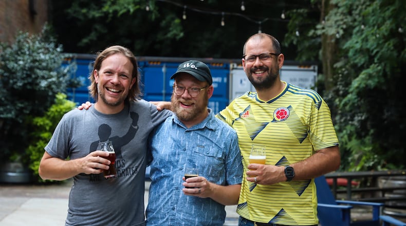 The trio who started Monday Night Brewing — (from left) CEO Jeff Heck, founder Jonathan Baker and CPO Joel Iverson — are ready to mark its 10th anniversary. (Courtesy of Ali Lamoureux / Monday Night Brewing)