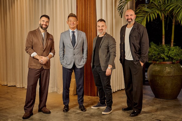 The team behind MidCity, including Bobi Stevkovski (music director), Justin Hong (director of finance), Goran Stevkovski (director of hospitality) and Jose Pereiro (beverage director), will open their second cocktail concept, Omma, in the Westside next year. (Courtesy of MidCity)