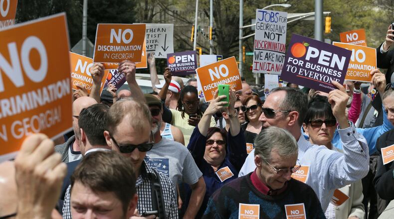 March 31, 2015 - Atlanta - Anti RFRA protestors march to the Capitol steps, where they chanted slogans and signed messages to their legislators. Georgians Standing Against Discrimination sponsored the Capitol Call Out - Rally & March. On day 39 of the 2015 Georgia Legislature, both the House and Senate were expected to go into the evening. Negotiations continue over HB 170, the transportation funding bill and SB 129, the “religious freedom” bill. The latter was the subject of a march and rally by opponents of the bill. BOB ANDRES / BANDRES@AJC.COM Opponents of the "religious liberty" legislation march to the Capitol in 2015. Bob Andres, bandres@ajc.com