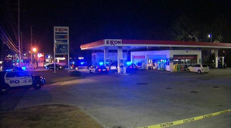 Police investigate a shooting that left one man dead and another critically injured Thursday in Marietta.