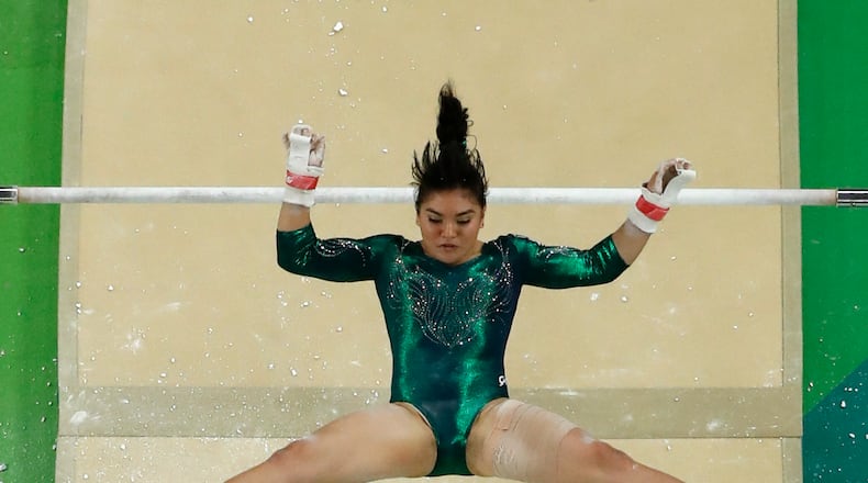 Mexico's Alexa Moreno performs on the uneven bars during the artistic gymnastics women's qualification at the 2016 Summer Olympics in Rio de Janeiro, Brazil, Sunday, Aug. 7, 2016. (AP Photo/Morry Gash)