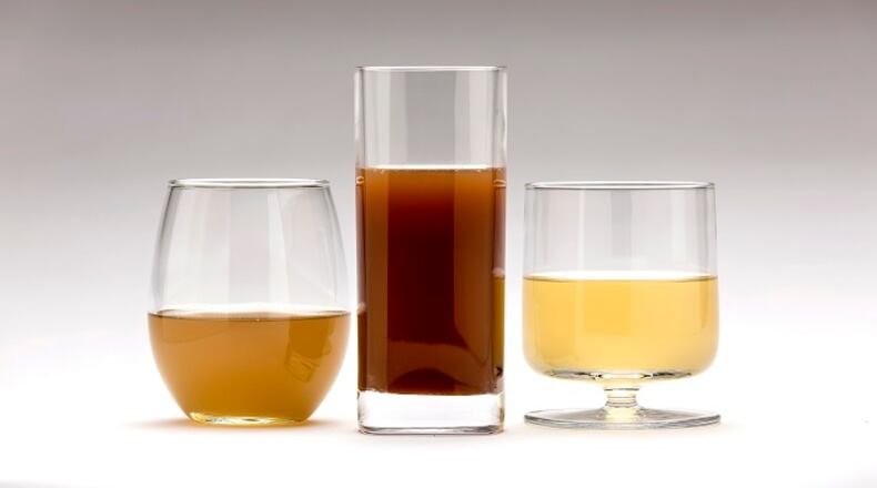 From left, chicken stock, dark beef stock and fish stock. (Ricardo DeAratanha/Los Angeles Times/TNS)