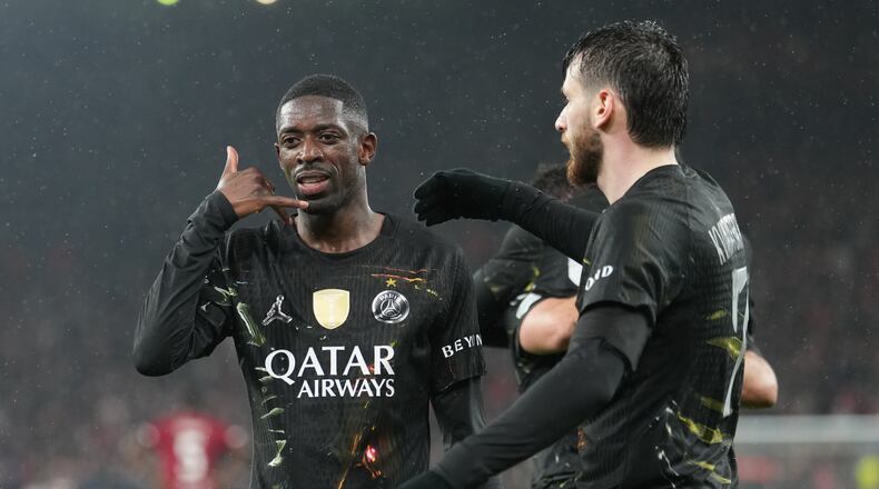 PSG's Ousmane Dembele celebrates after scoring during the Champions League quarterfinal second leg soccer match between Liverpool and Paris Saint-Germain in Liverpool, England, Tuesday, April 14, 2026. (AP Photo/Jon Super)