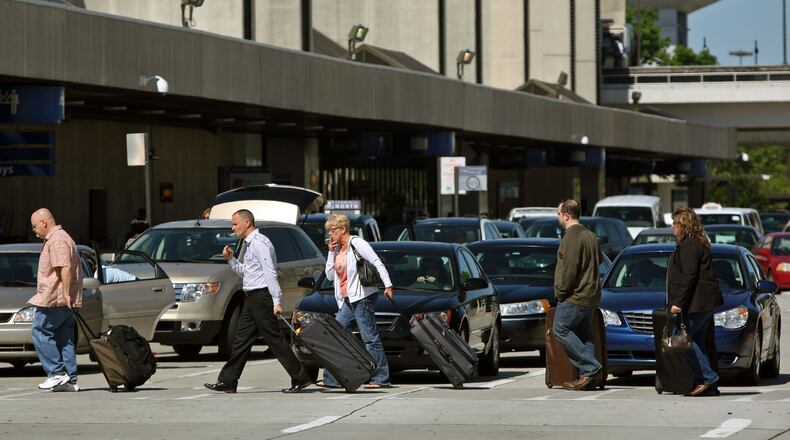 Hartsfield-Jackson International Airport will open a free parking lot that allows drivers to stay for a limited time while passengers get to the curb. The goal is prevent cars from circling the airport waiting to pick up people.