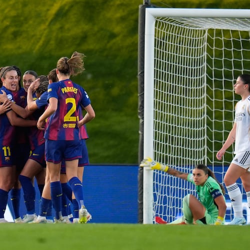 Barcelona players celebrate after Esmee Brugts scored her side's second goal during the women's Champions League quarterfinal first leg soccer match between Real Madrid and Barcelona in Madrid, Spain, Wednesday, March 25, 2026. (AP Photo/Manu Fernandez)
