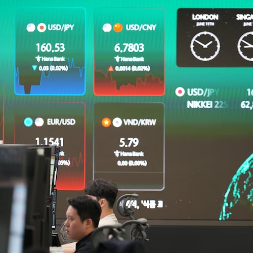 A screen shows foreign exchange rates at a dealing room of Hana Bank in Seoul, South Korea, Thursday, June 11, 2026. (AP Photo/Lee Jin-man)