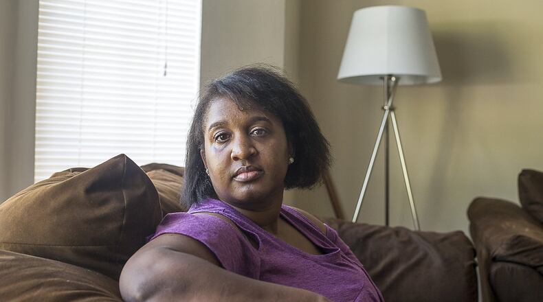 “All I know is keep it pushing,” Millicent Benson, 37, said at her residence in Jonesboro, Monday, September 9, 2019. In 2018 Millicent was assaulted in her home by alleged Clayton County serial rapist Kenneth Thomas Bowen III. Following the assault, Millicent spoke with media personnel with hopes that her story would encourage other women to speak and her perpetrator to be caught. She said that she has been in contact with at least 3 other women that were allegedly attacked by Bowen. “I wasn’t going to be ashamed, not me. And not any other women,” Millicent said. “I didn’t want to steal my future.” (Alyssa Pointer/alyssa.pointer@ajc.com)