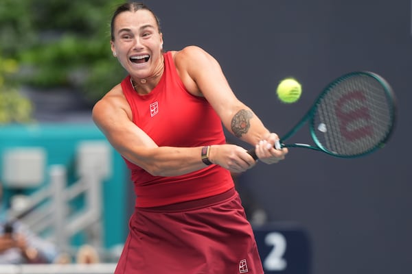 Aryna Sabalenka hits a return to Jessica Pegula during the women's singles final match at the Miami Open tennis tournament, Saturday, March 29, 2025, in Miami Gardens, Fla. (AP Photo/Marta Lavandier)