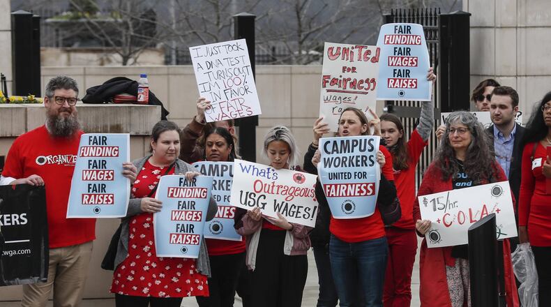 A group of college graduate students called the United Campus Workers of Georgia held a rally at Liberty Square across from the the state Capitol on Feb. 5, 2020 to demand higher wages and other benefits from the University System of Georgia. They are now demanding changes they say are needed to protect the health of workers amid the coronavirus pandemic.
