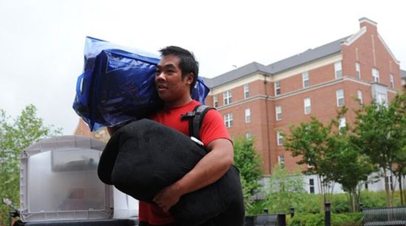 UGA is asking older students to forgo their dorm rooms for freshmen and offering them cash to do so. (AJC file photo)