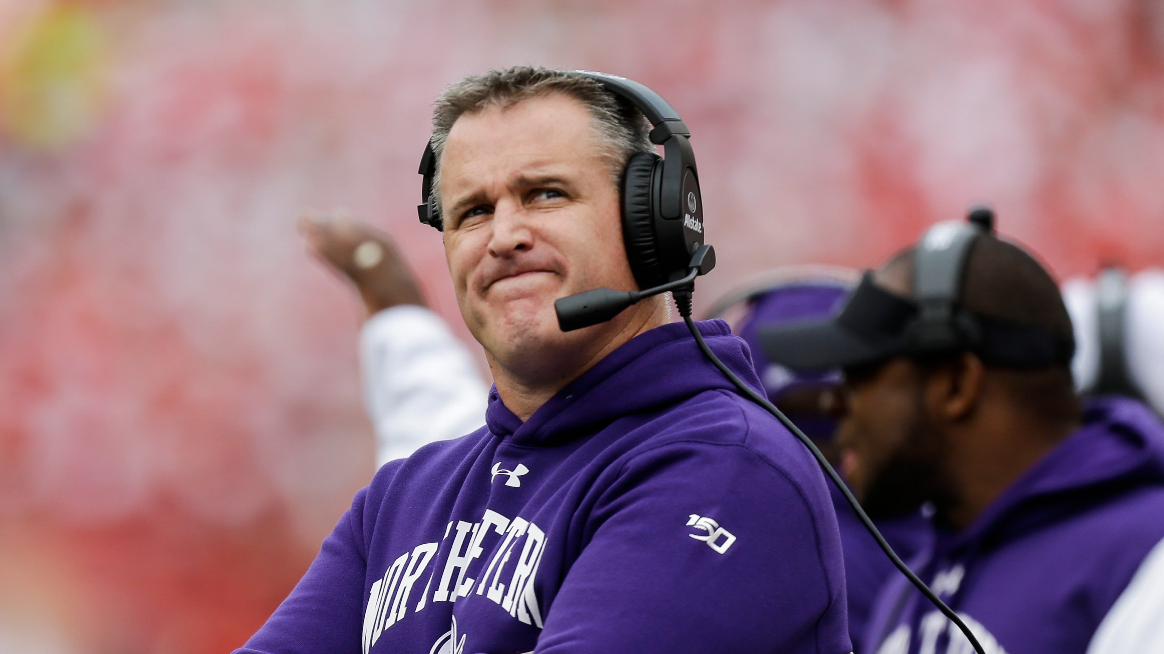 FILE - Northwestern head coach Pat Fitzgerald looks up on the sideline during the first half of an NCAA college football game against Wisconsin Saturday, Sept. 28, 2019, in Madison, Wis. (AP Photo/Andy Manis, File)