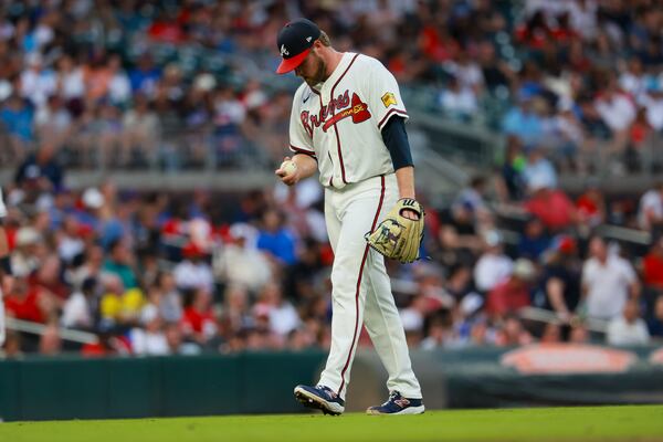Braves starting pitcher Bryce Elder reacts after giving up a hit to a Mets player during the second inning on Monday, Aug. 10, 2026, in Atlanta. (Jason Getz/AJC)