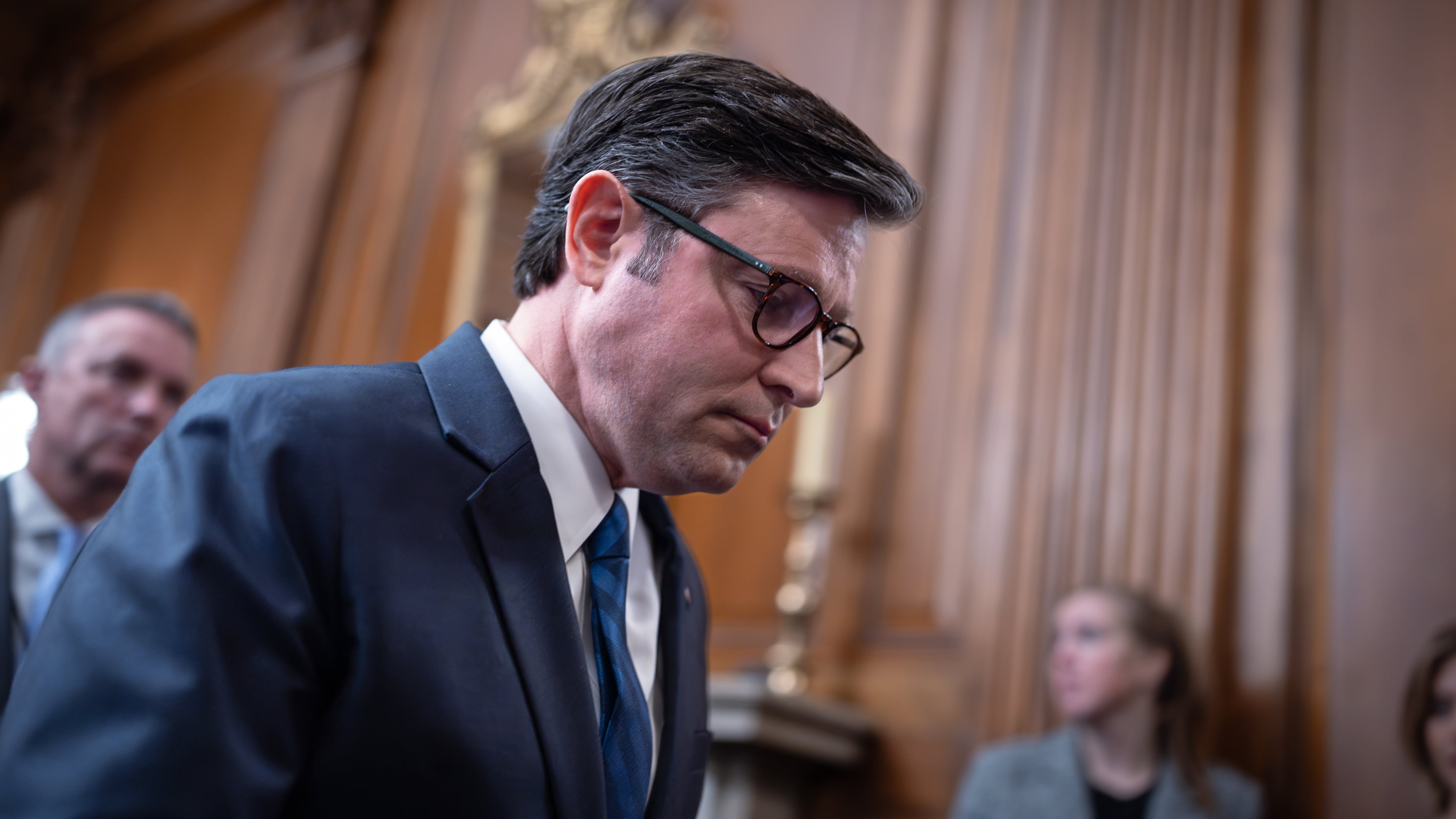 Speaker of the House Mike Johnson, R-La., departs a news conference on the 30th day of the government shutdown, at the Capitol in Washington, Thursday, Oct. 30, 2025. (AP Photo/J. Scott Applewhite)