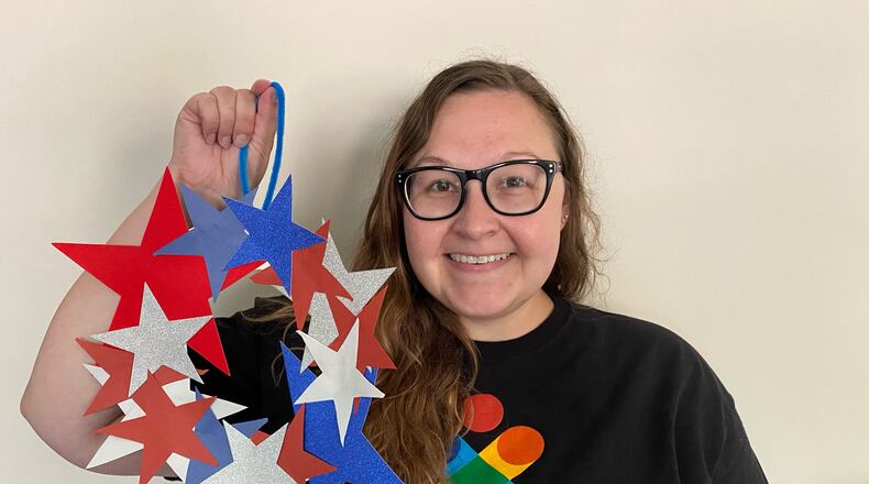 Allyson Eads shares her love of crafting with children at South Cobb Regional Library in Mableton. July 4th wreath craft kits can be picked up from June 28 - July 3.