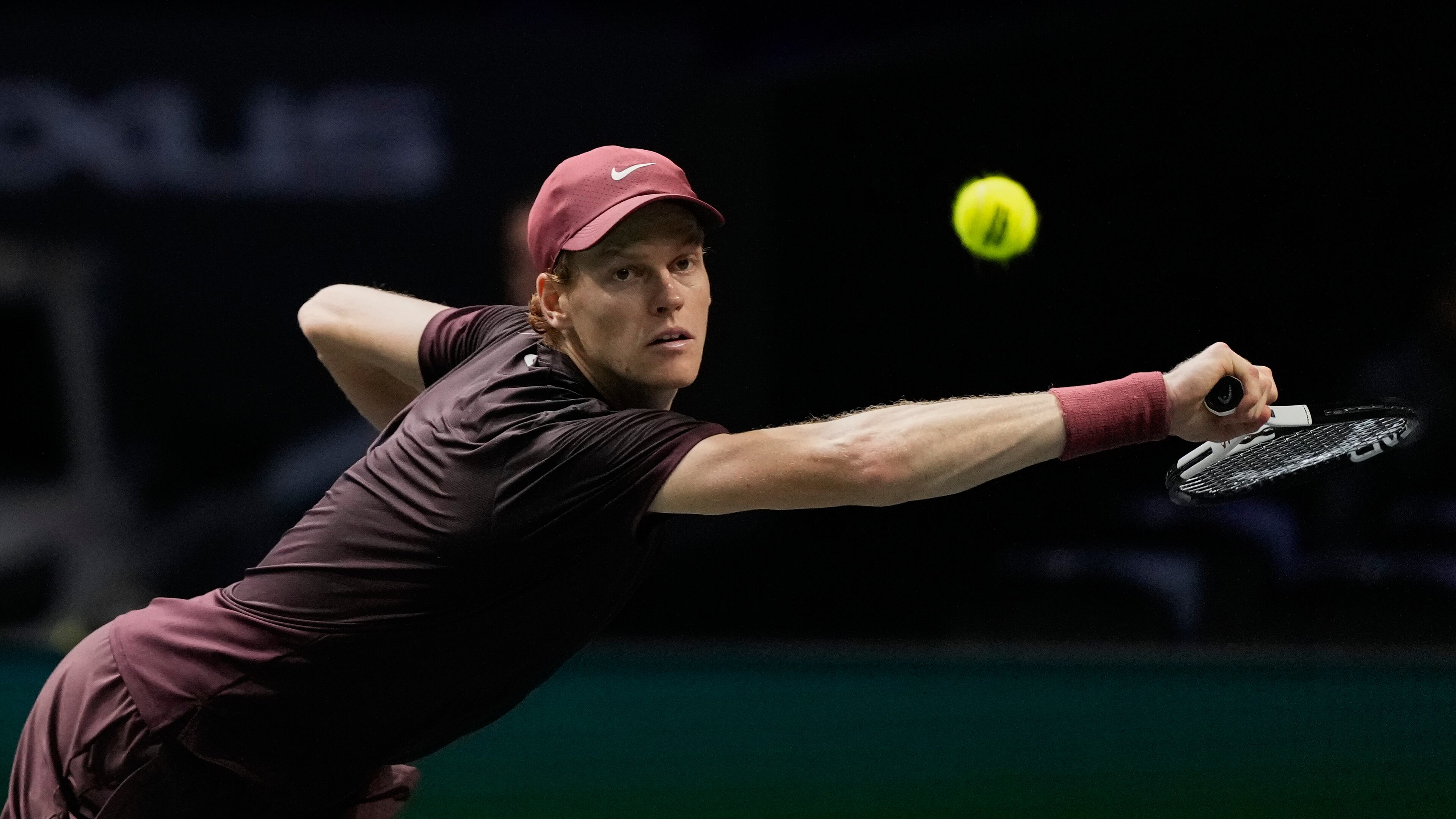 Italy's Jannik Sinner returns to Ben Shelton of the United States during a quarterfinal match of the Paris Masters tennis tournament in Paris, Friday, Oct. 31, 2025.((AP Photo/Michel Euler)