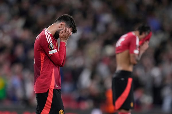 Manchester United reacts at the end of the Europa League final soccer match between Tottenham Hotspur and Manchester United at the San Mames Stadium in Bilbao, Spain, Wednesday, May 21, 2025. (AP Photo/Bernat Armangue)